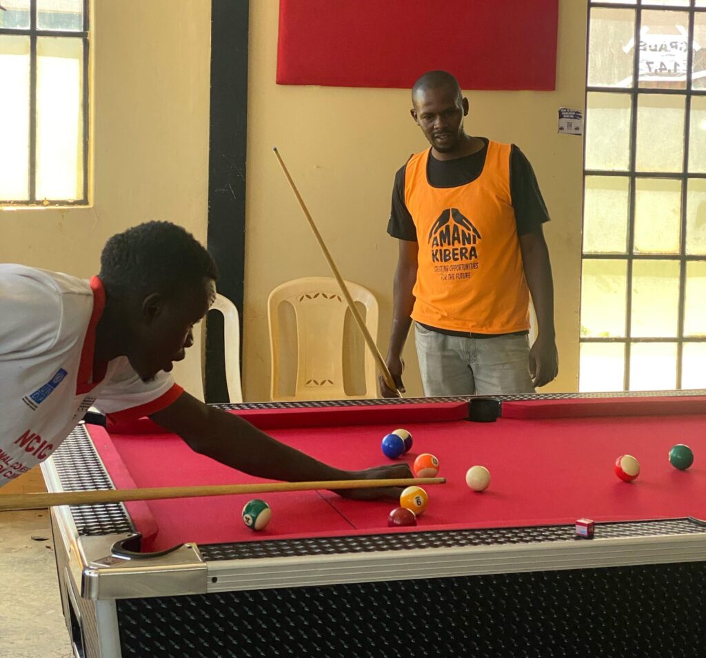 An ongoing game of pool.